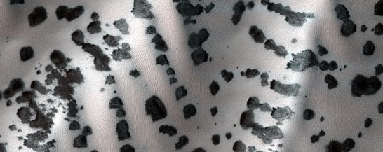 zebra-skin-just-kidding-this-is-a-dune-field-thats-speckled-with-oval-shaped-mineral-deposits